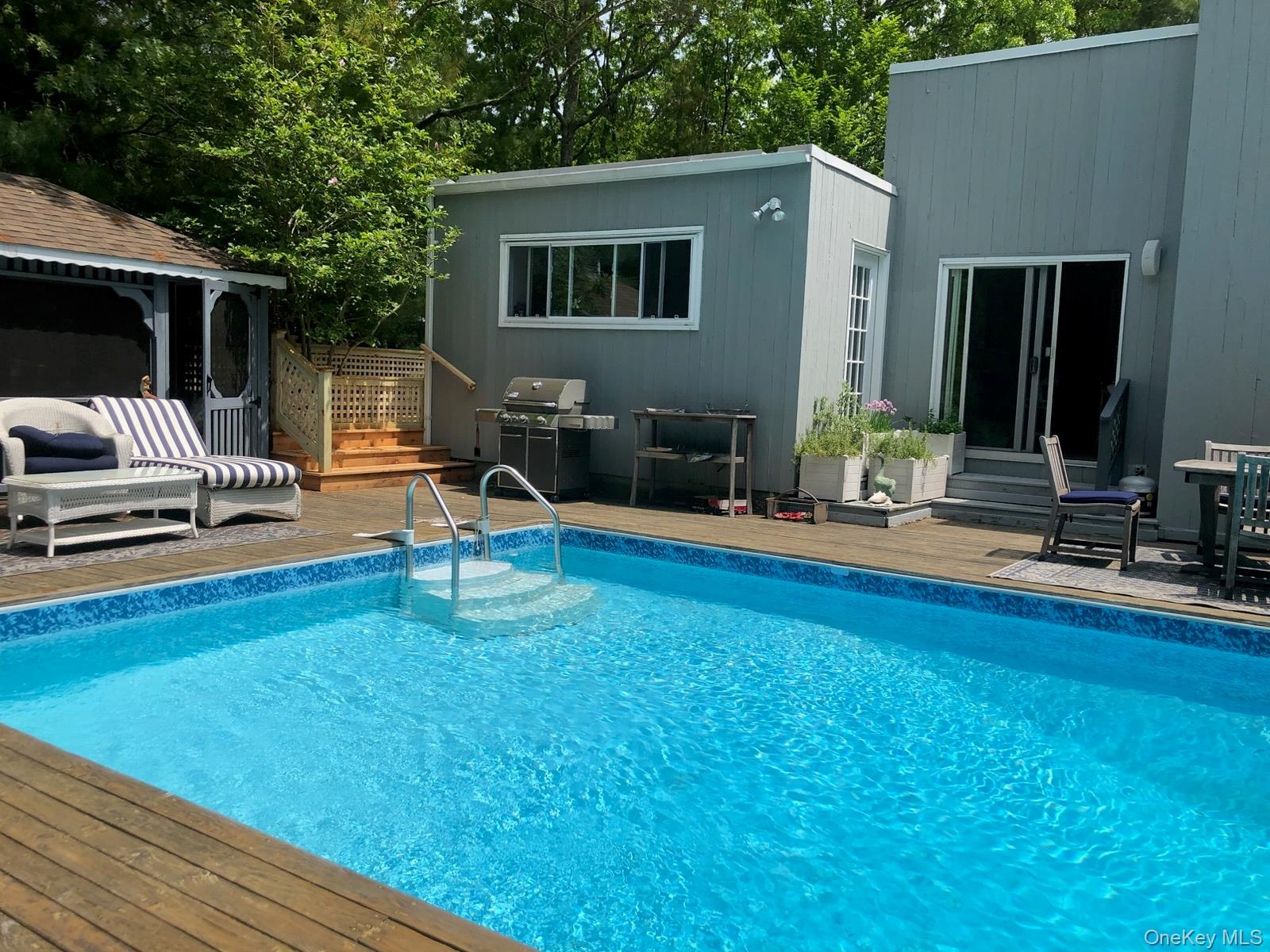 Heated pool with spacious entertaining Deck surround