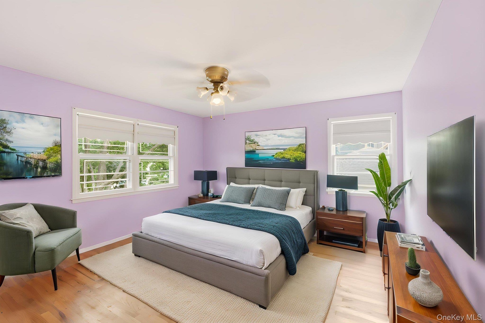 Recessed lighting, wood-finish flooring, and multiple windows