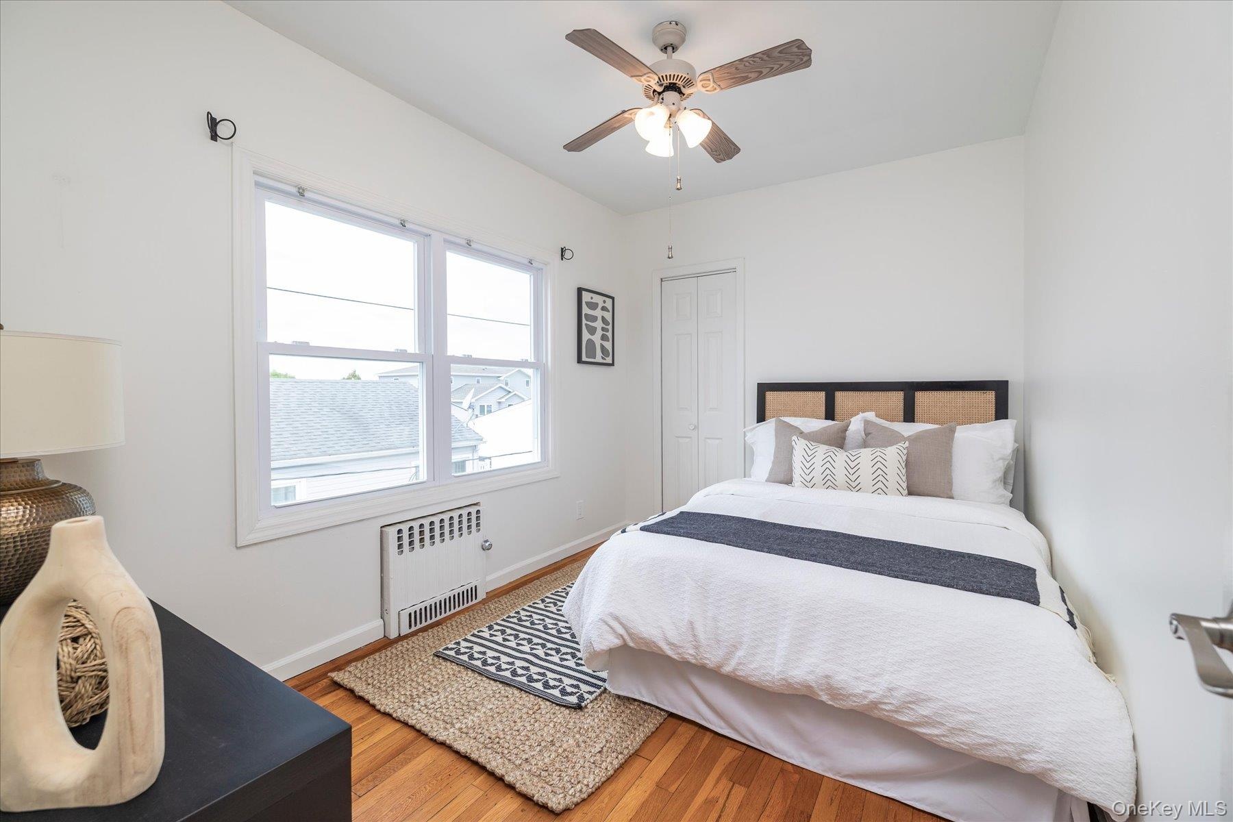 Bedroom with hardwood floors