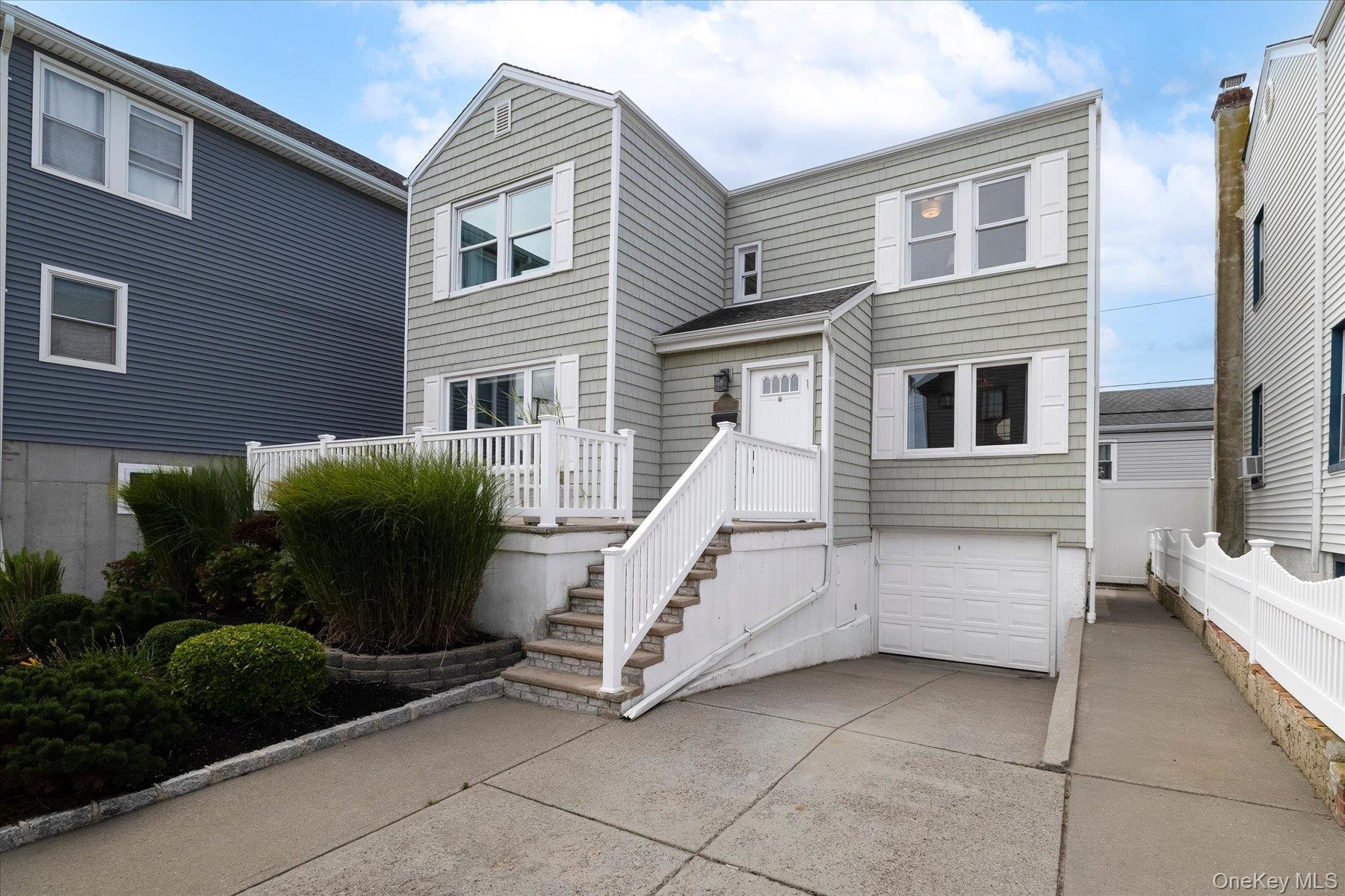 Garage and driveway with parking