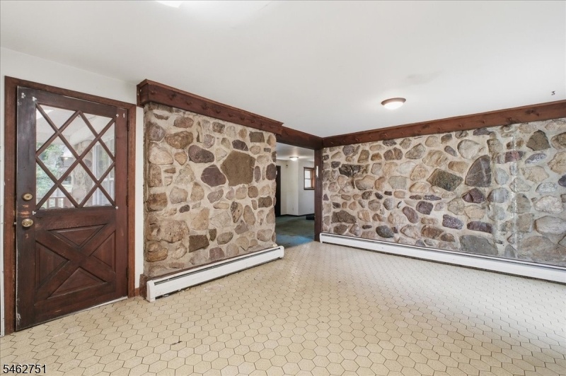 Kitchen/exposed stone wall