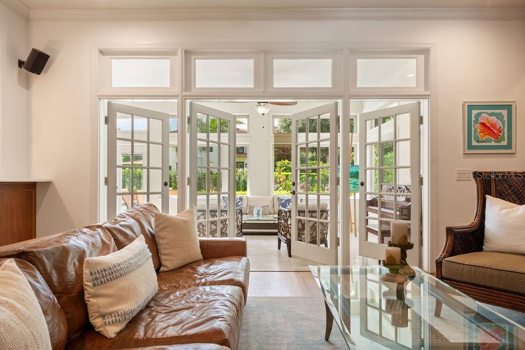 Family room leading to light and bright sunporch.