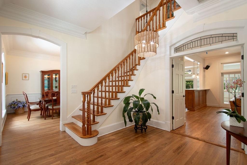 Foyer with dining room to the left, formal living room to the right.