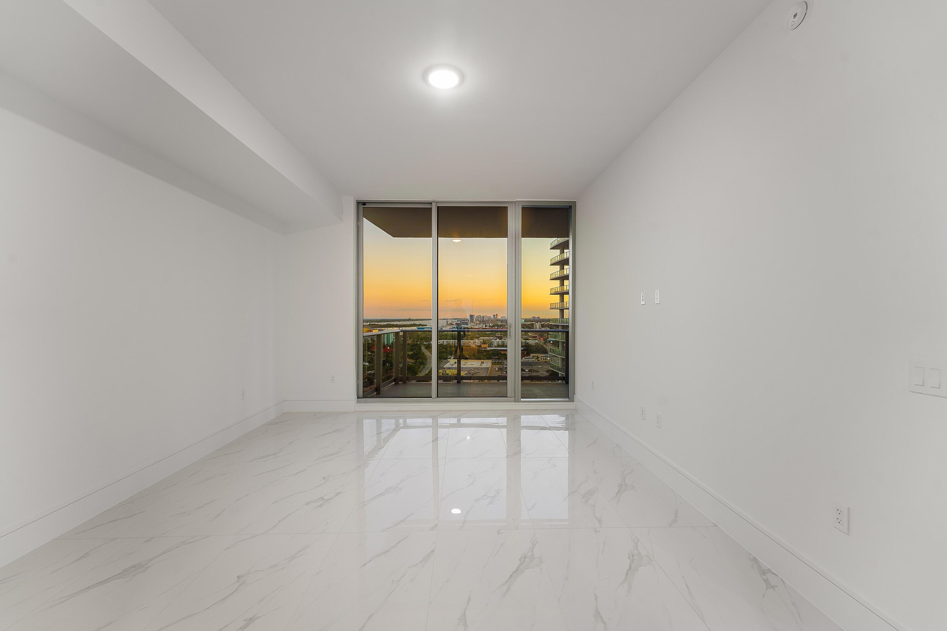 Primary; Sunset; South; Floor-to-Ceiling Sliders open to Terrace