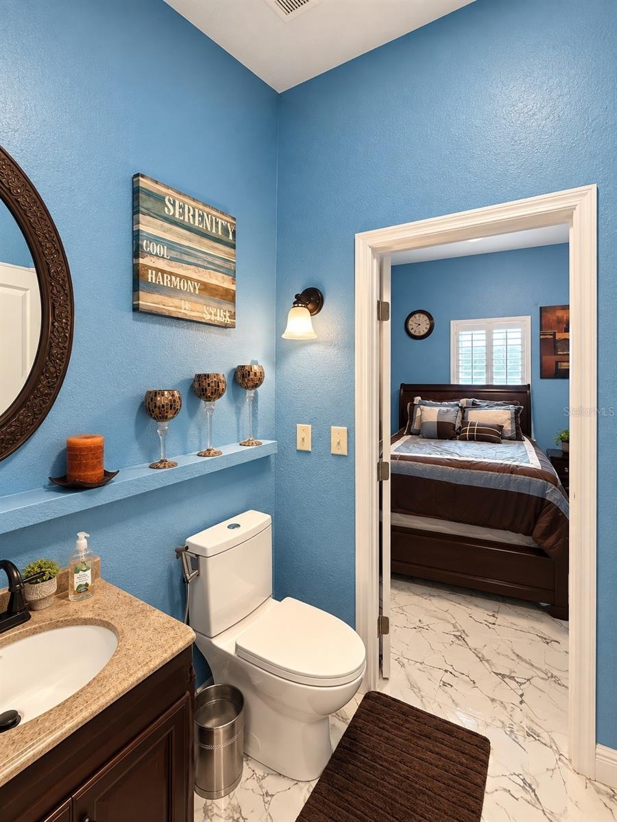Dual access half bathroom