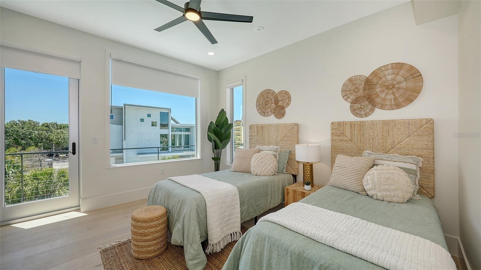 Guest bedroom with access to balcony