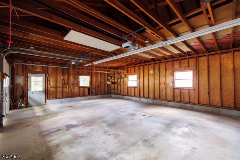 Spacious 3 car garage w/loft
