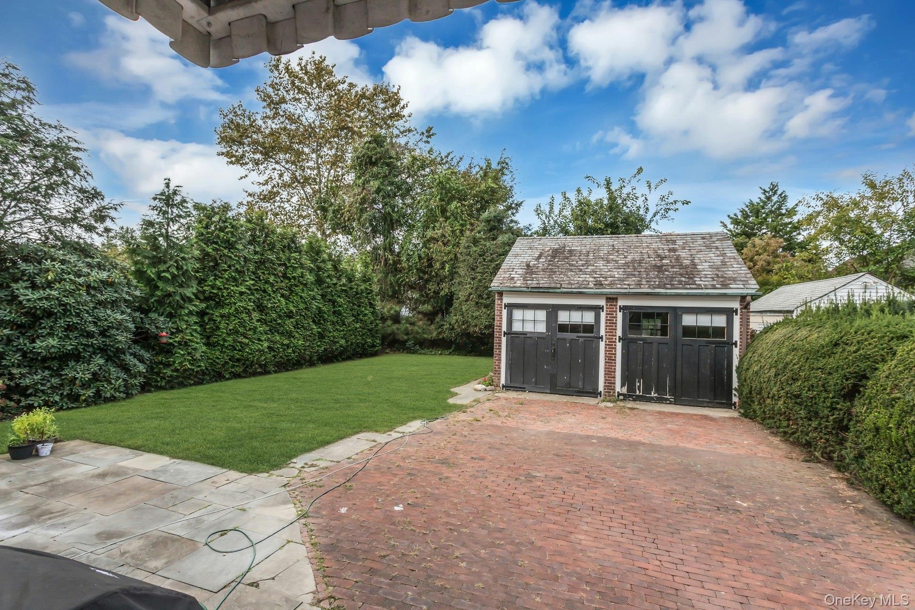 Detached two-car garage with brick construction