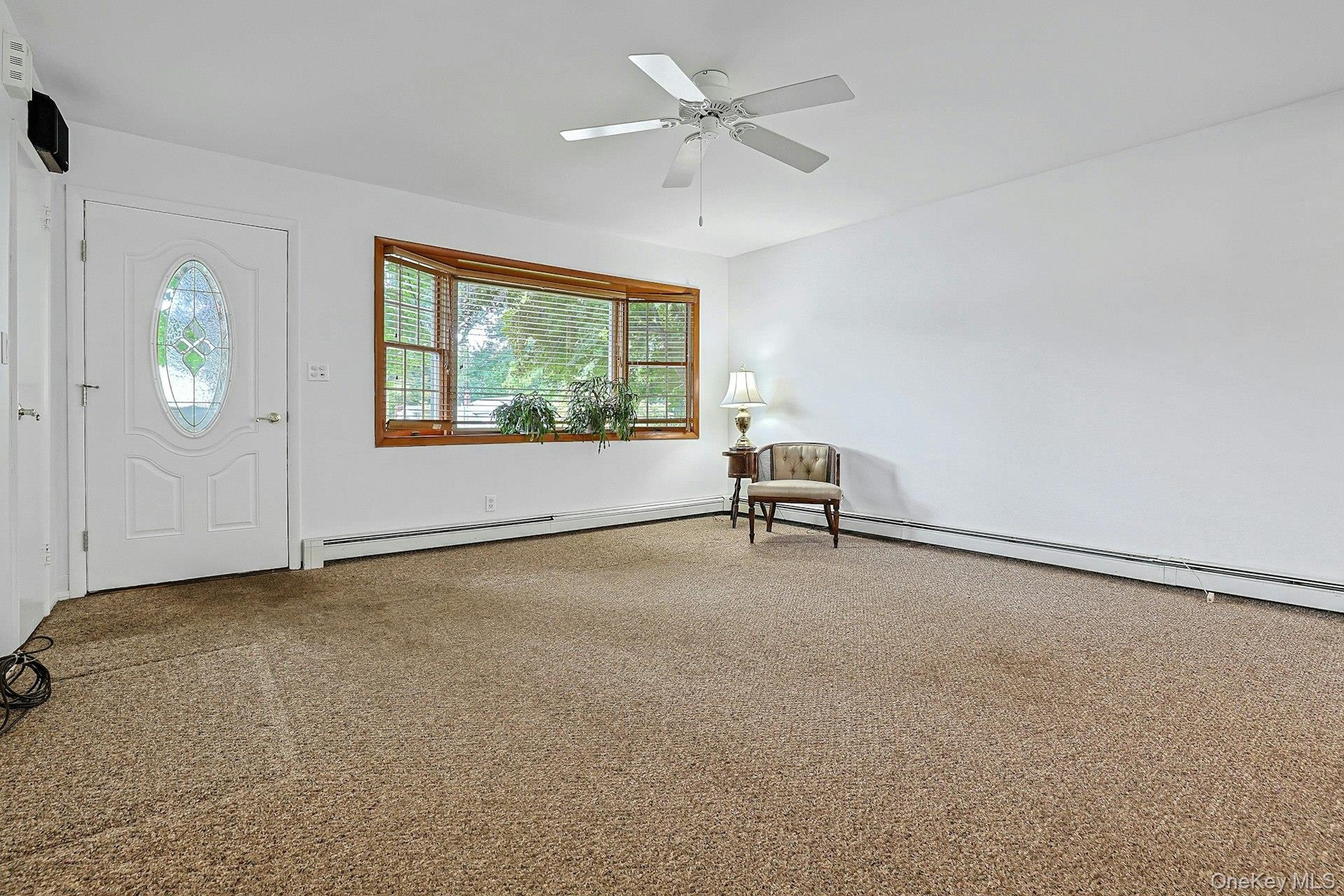 Living room with bay window.