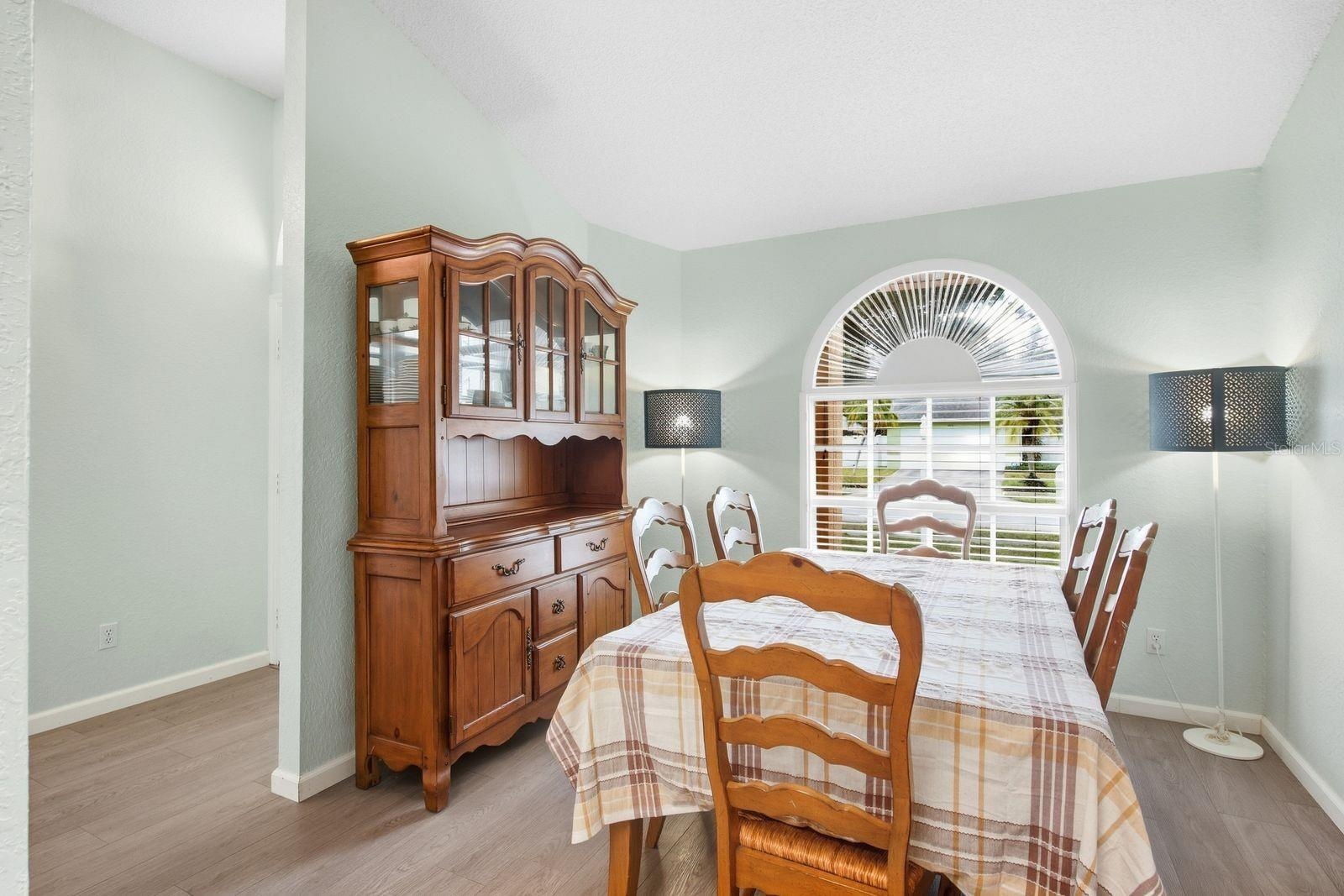 Gather around the table in this inviting dining area.