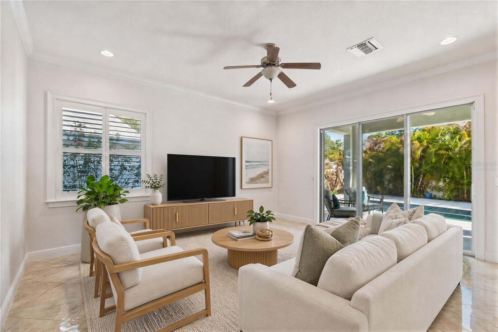 Virtually staged  living room illustrating one way to furnish the space.