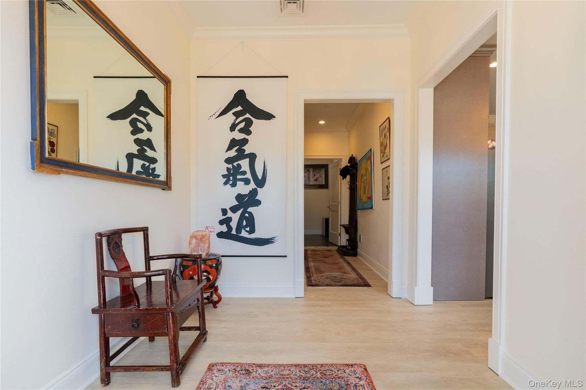 Foyer with Hallway to Laundry & Garage