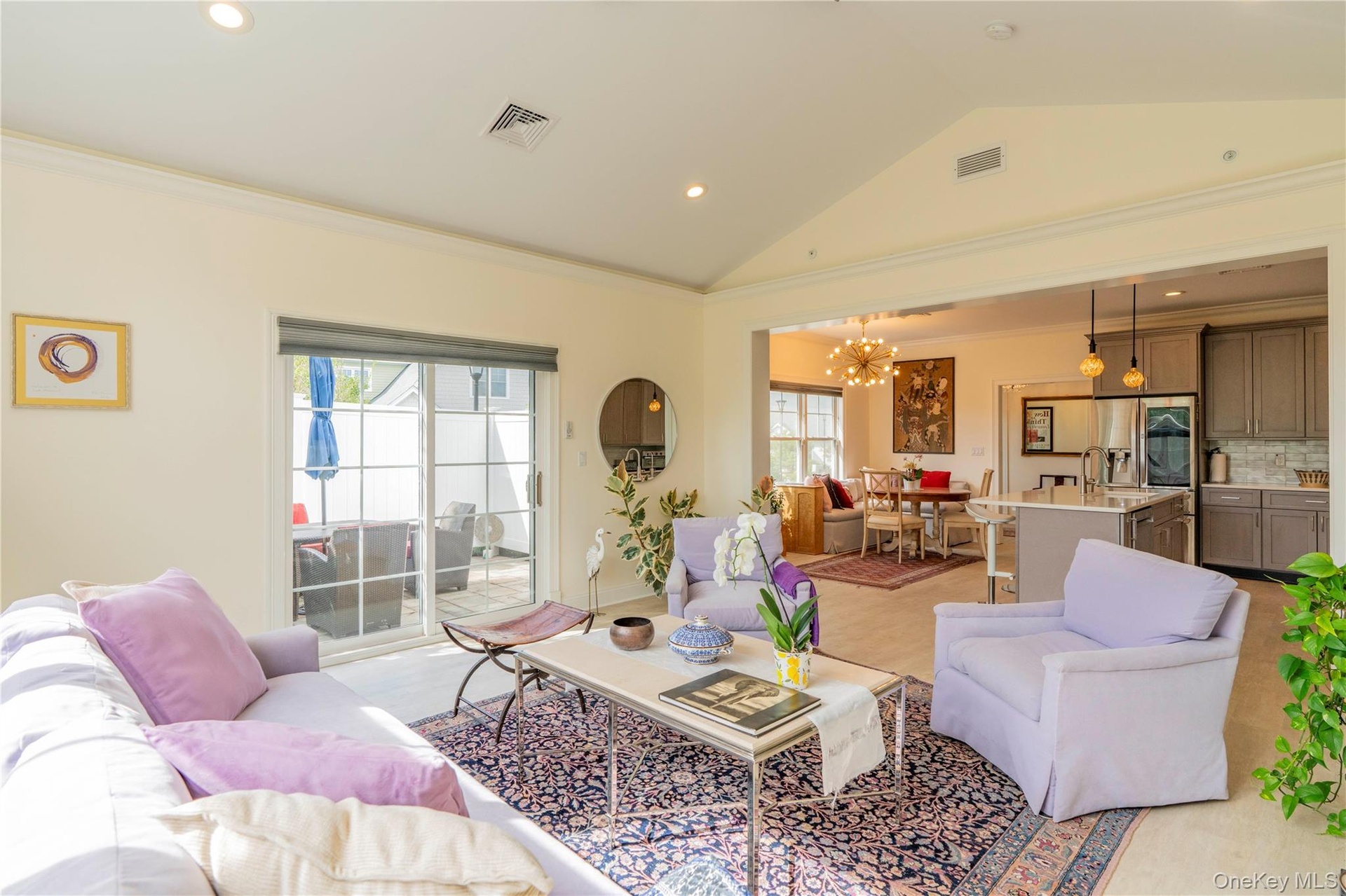 Sliding Glass Doors Lead to Patio off the Living Room