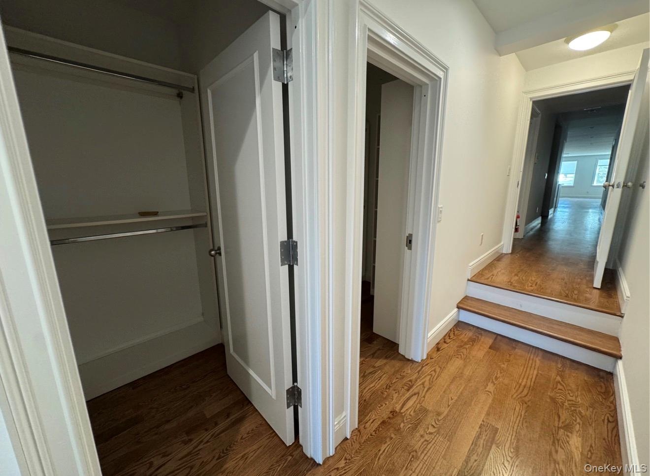 Two walk in closets in Primary bedroom