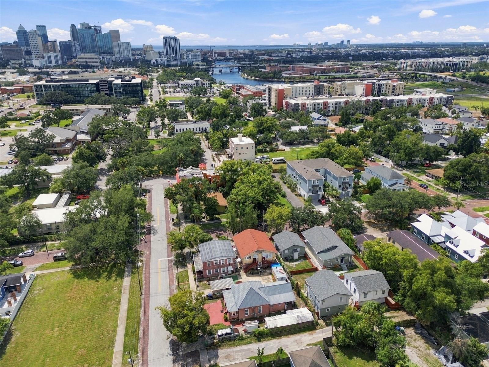 this property is fronted by N Highland Ave with an Alley across the north side