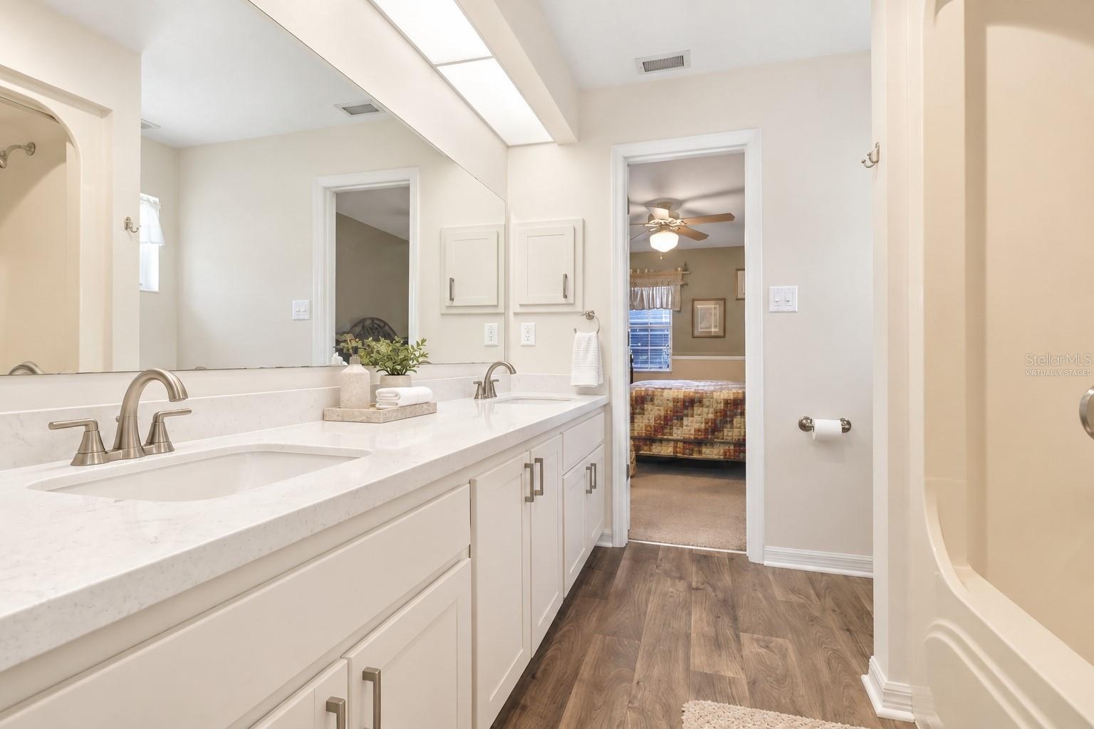 Virtually Staged - Jack and Jill Bathroom between Bedroom 2 and 3