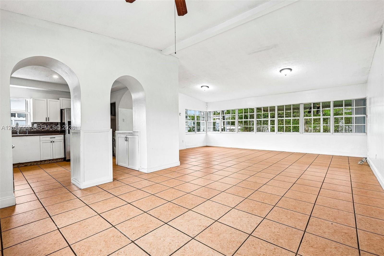 Living and dining area, unstaged (same room as photo 7)