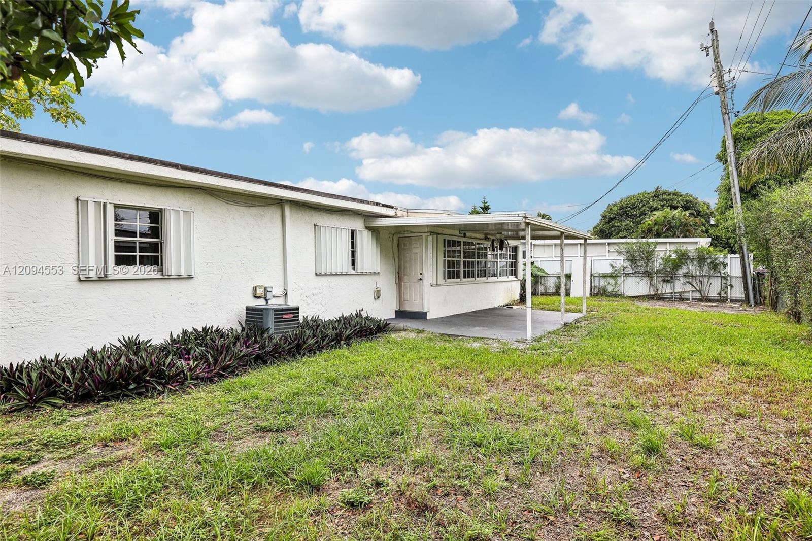 Backyard, unstaged (same view as photo 5)