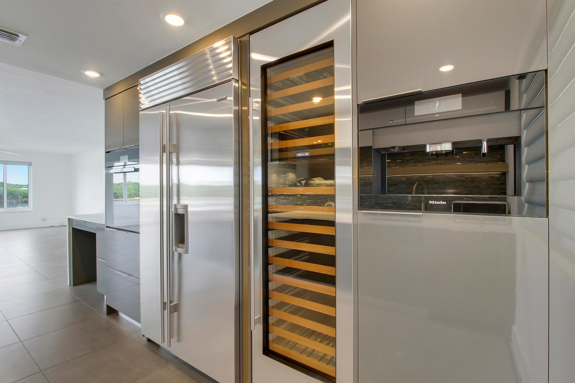 Full wine fridge and Miele coffee machine