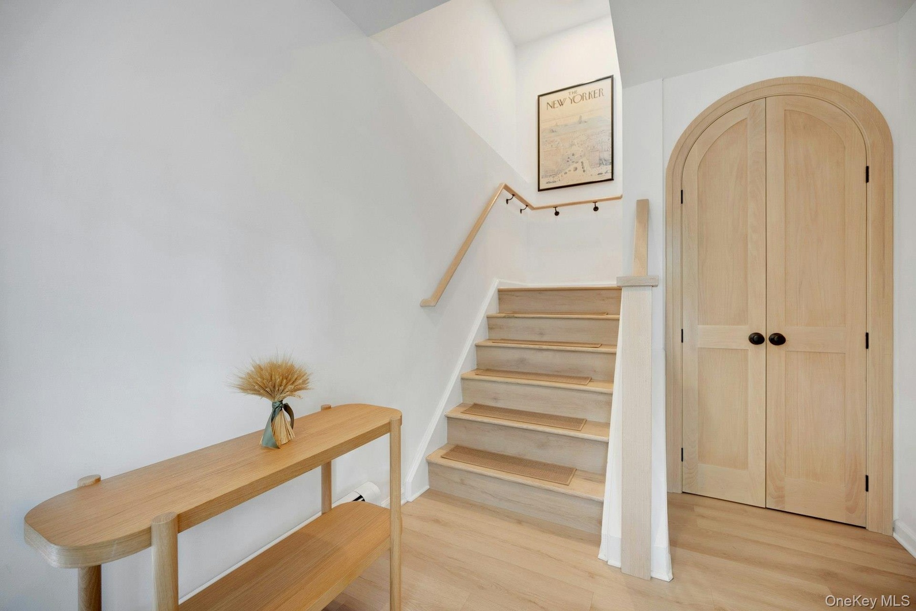 Custom arched entry closet...