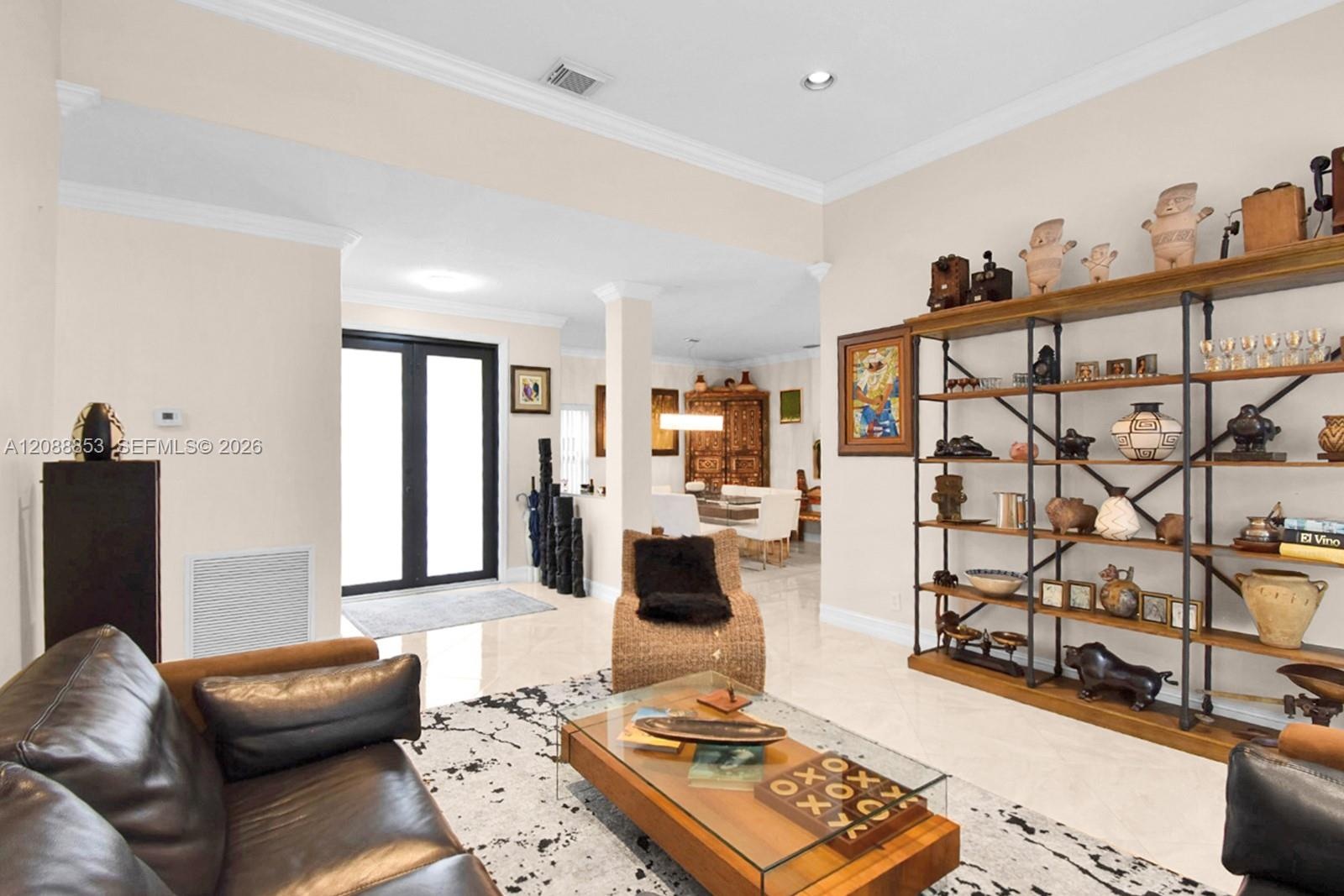 Full impact entry door. Bright living area designed for comfortable everyday living and entertaining