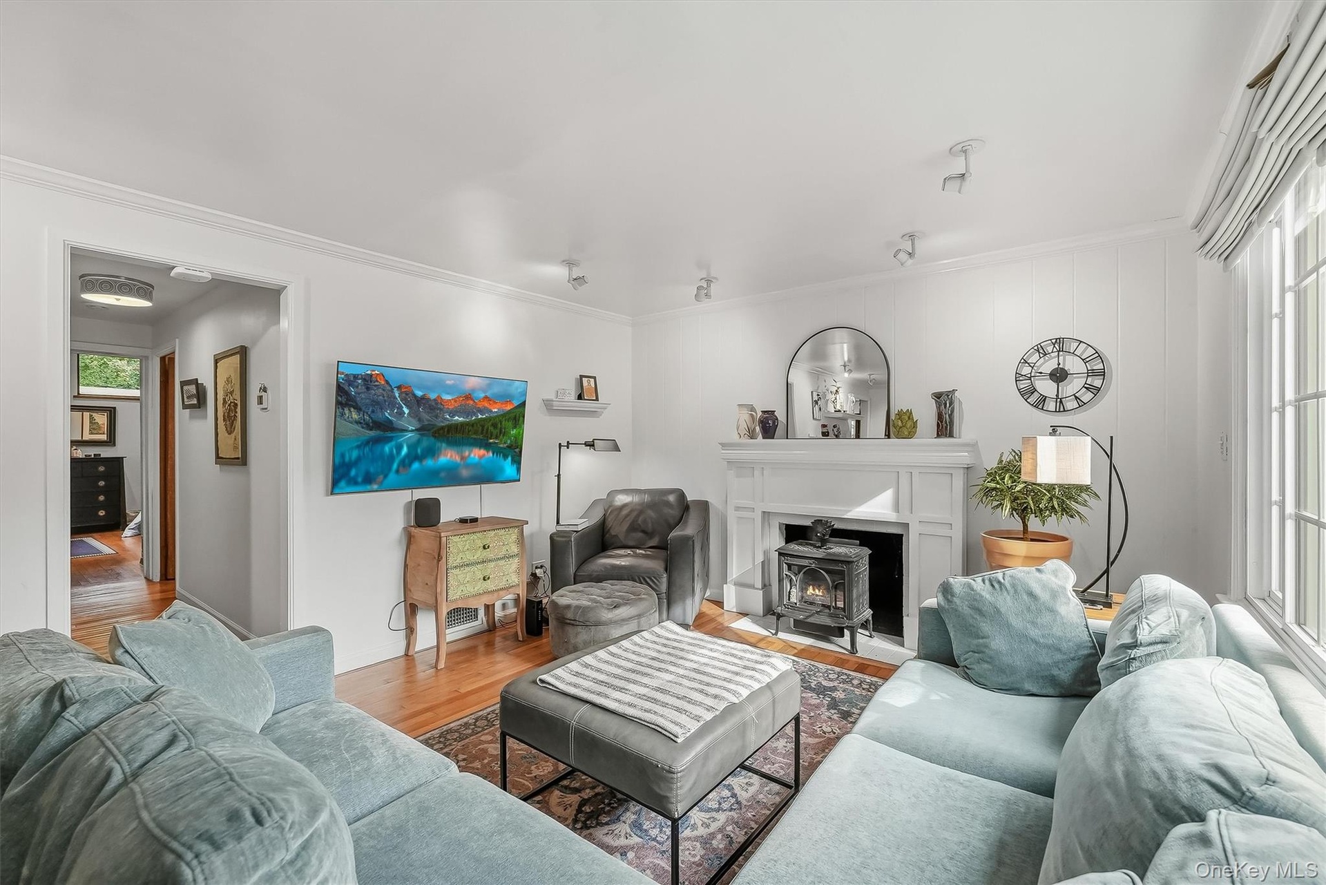 Gleaming hardwood flooring accent the home.