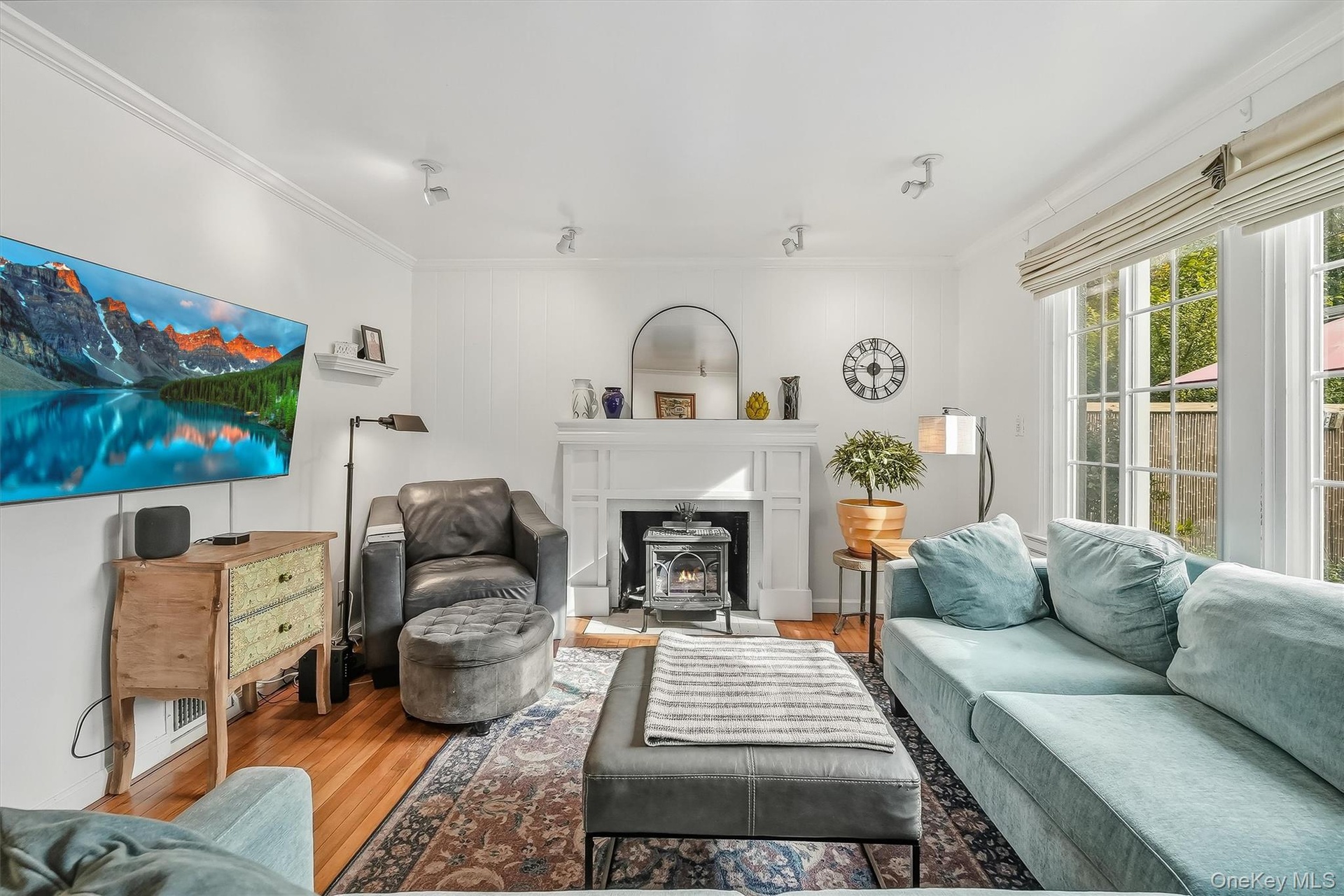 The perfect spot to unwind and relax!  The custom mantle accents the gas stove.