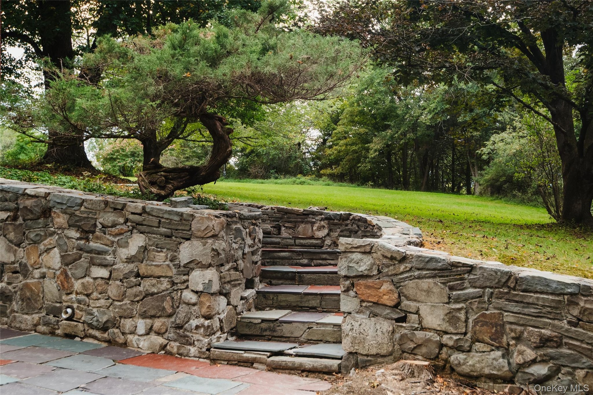 Slate walkway from front door to basement entry