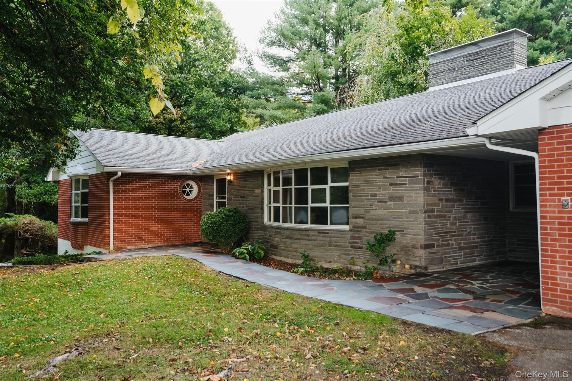 Slate walkways surround the house