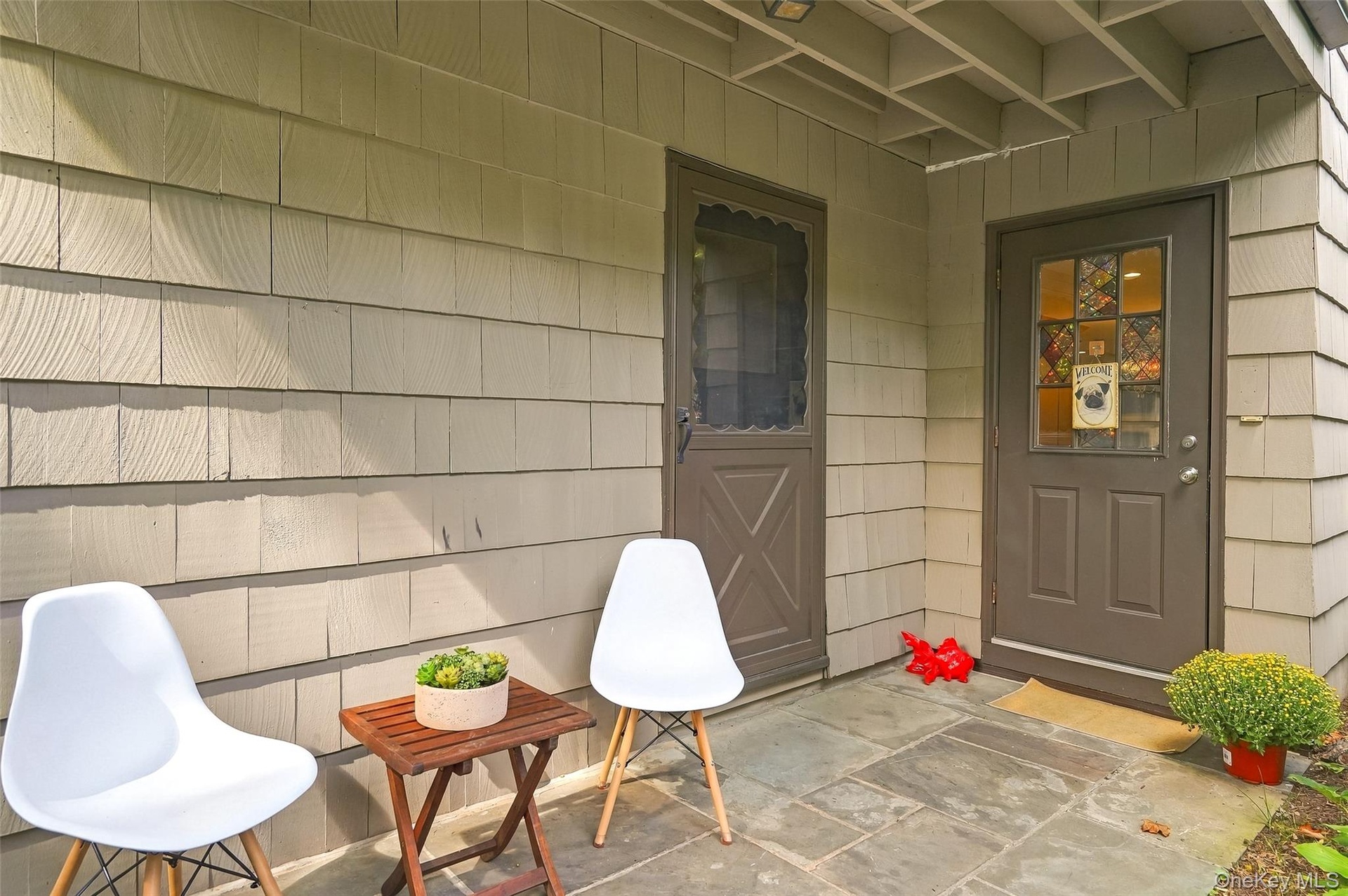 Sip your coffee and solve Wordle on your covered front patio with direct entries into your living aea and primary suite.
