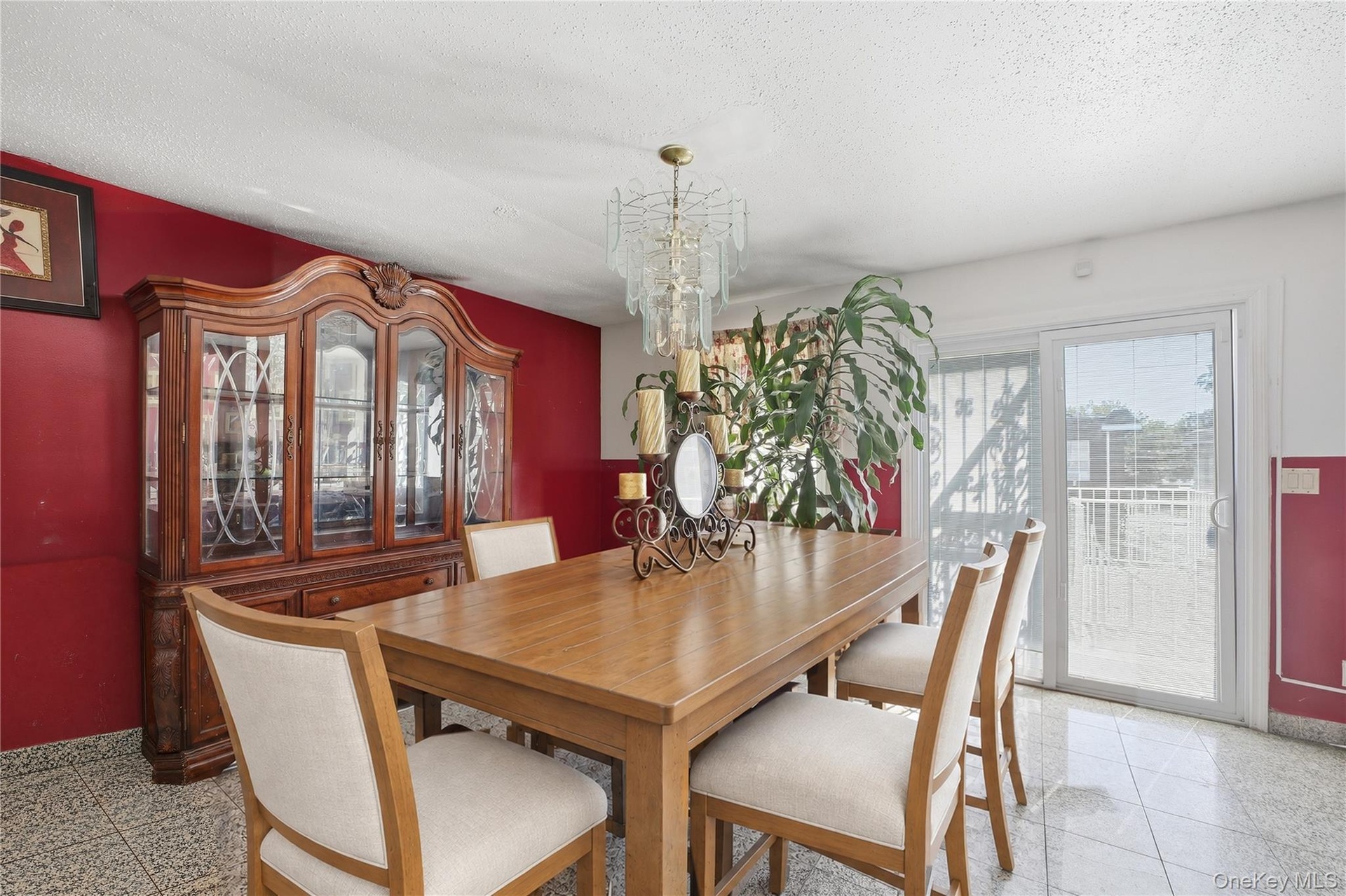 Unit 2 - Dining and family area toward the rear balcony. Virtually staged and digitally decluttered.
