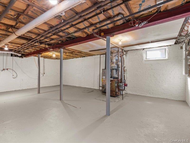 Full unfinished basement with utilities.