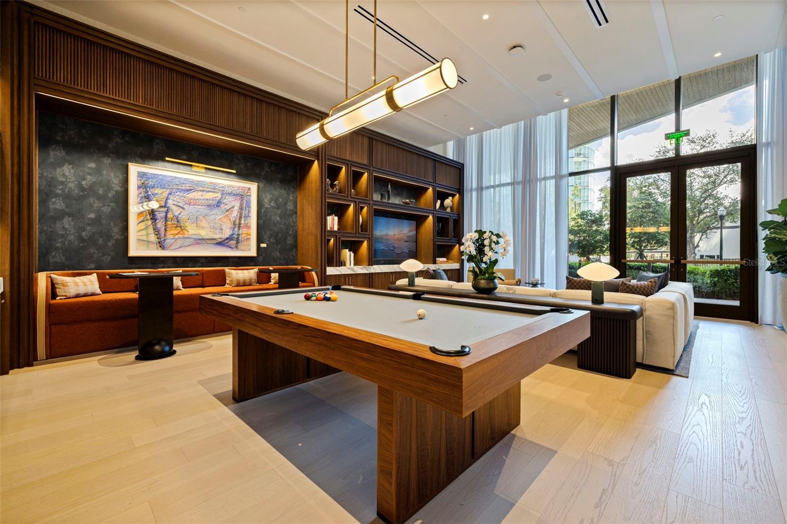 Richly appointed resident lounge space for gathering, relaxing, or entertaining.