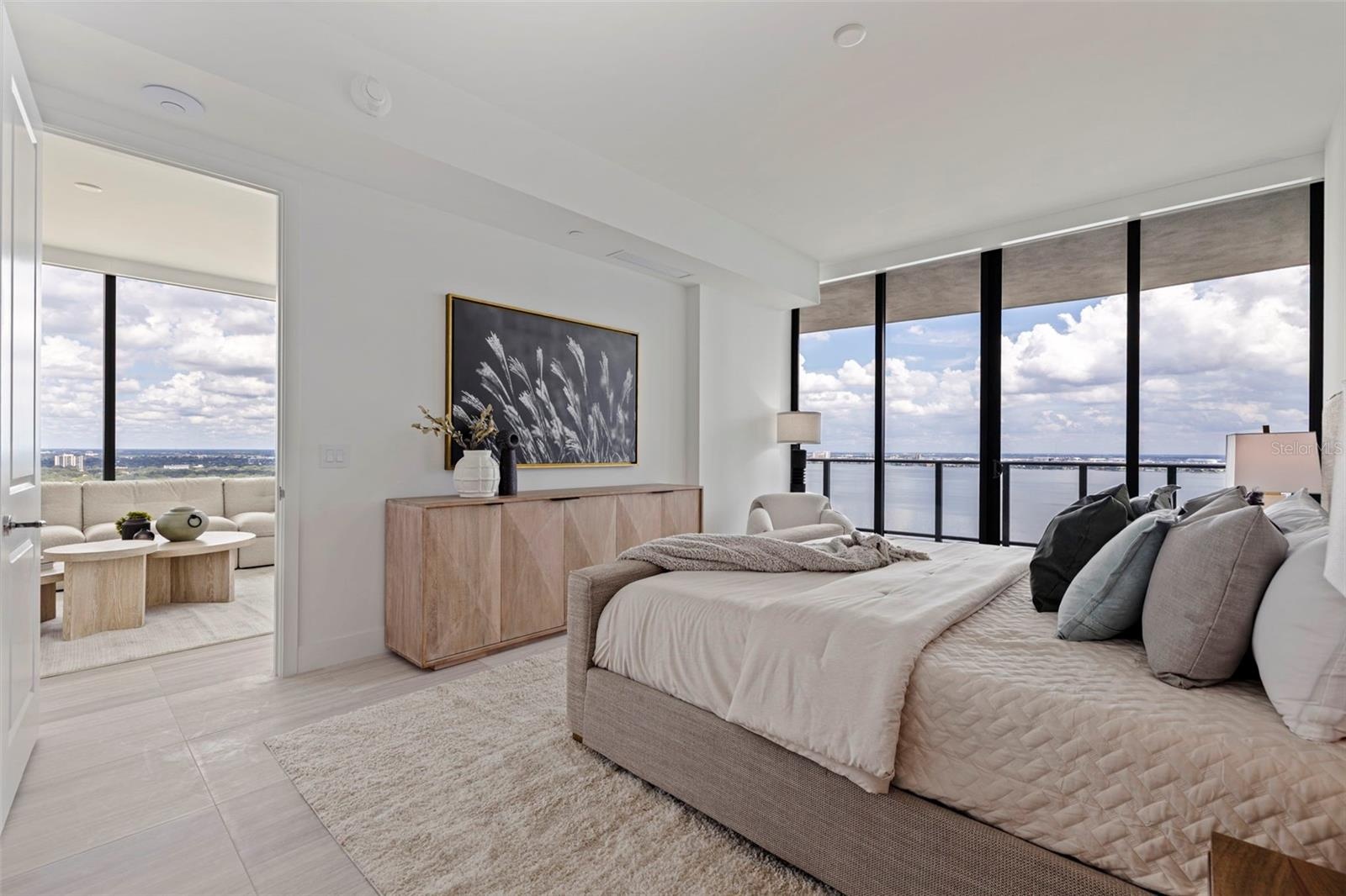 A private retreat with direct balcony access and sweeping 24th-floor views.