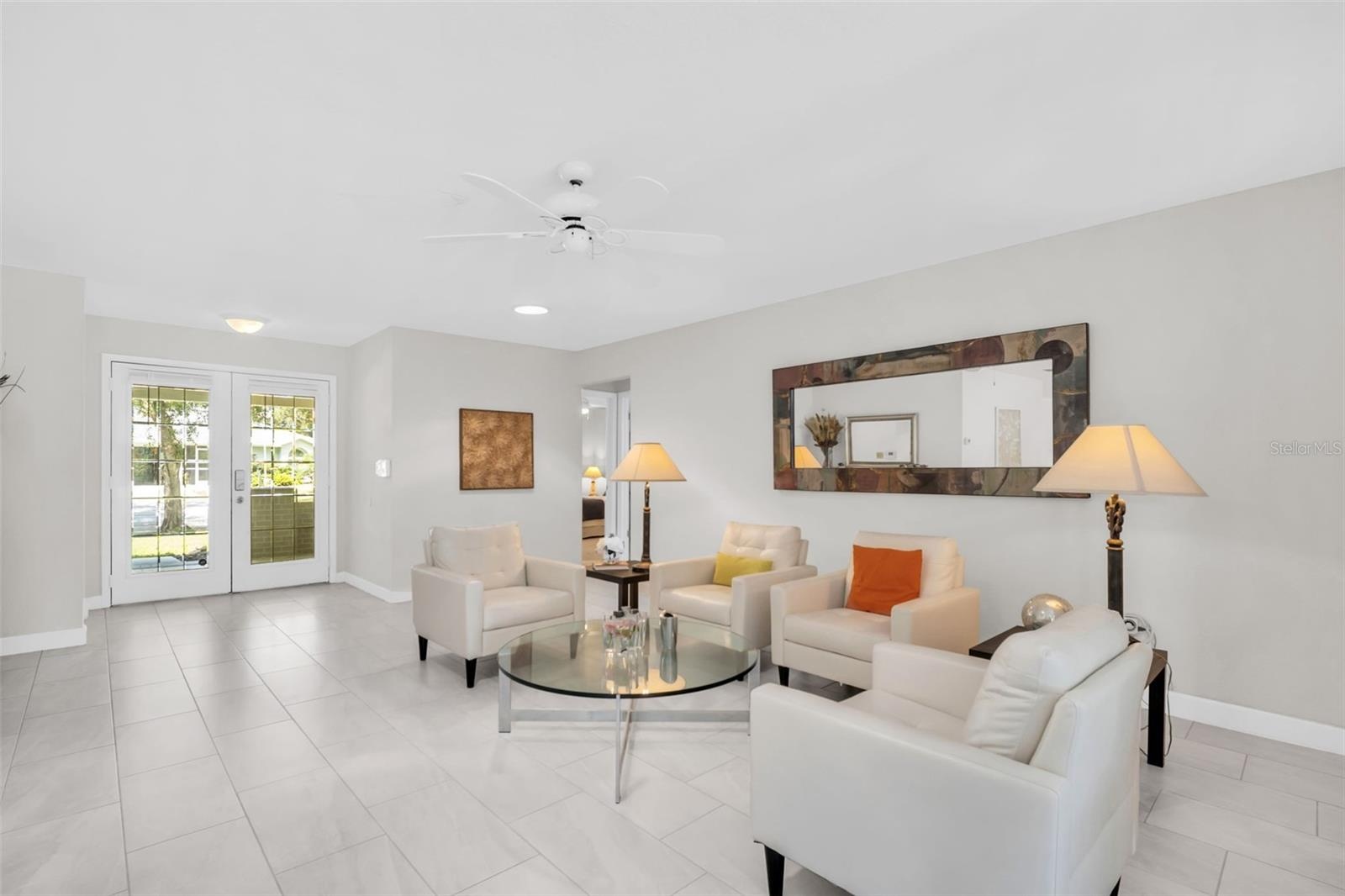Jaw dropping glass front door entry with a convenient coat closet~
