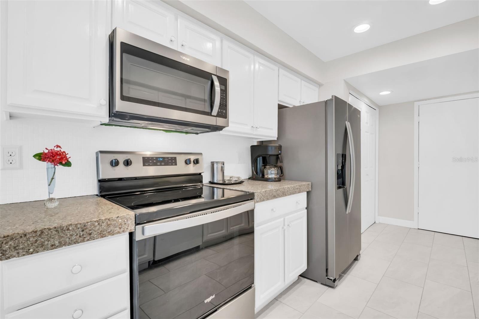 Convenient garage access and a large pantry closet~