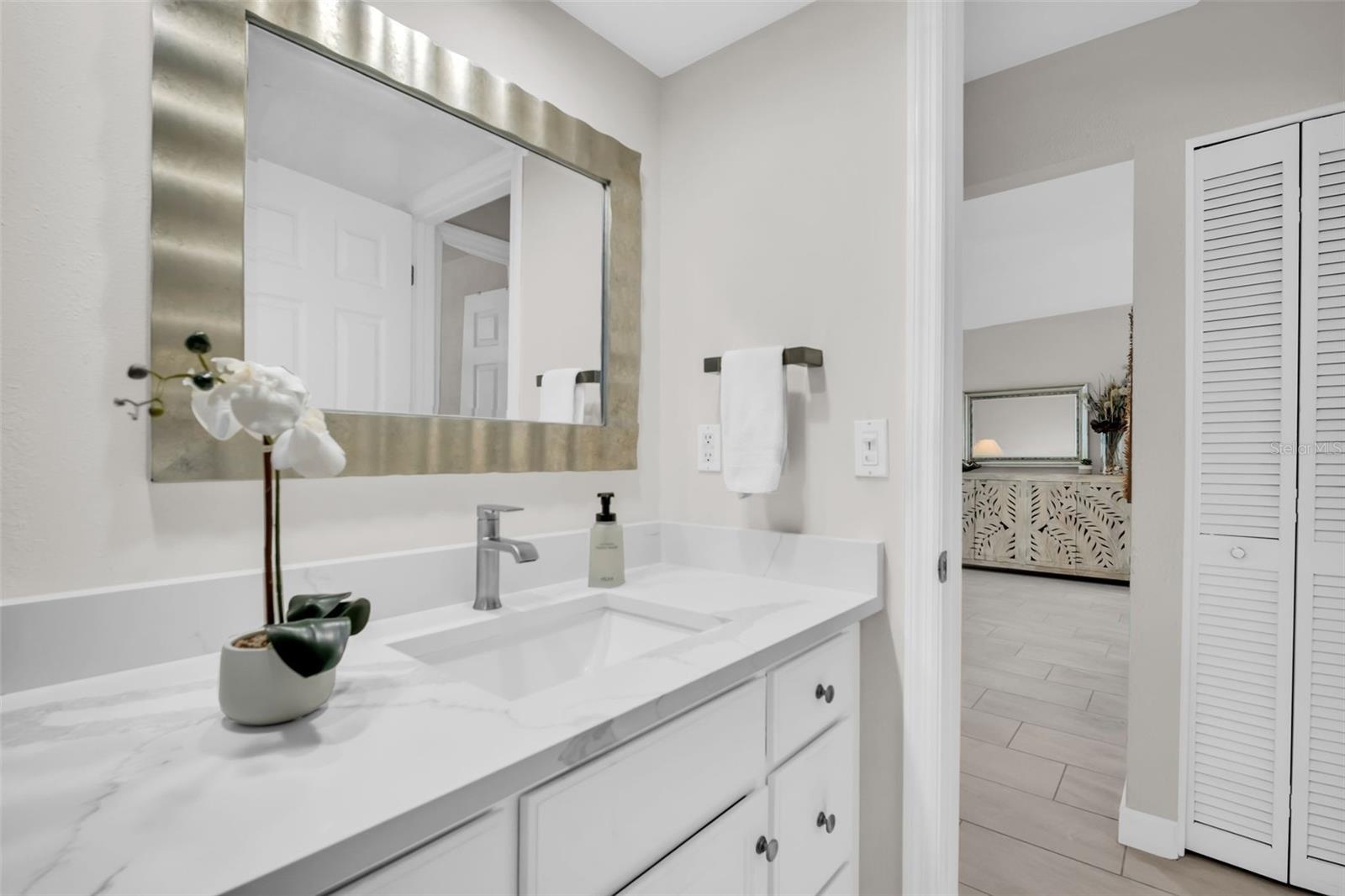 Perfectly located tucked between the main living & guest suite~
