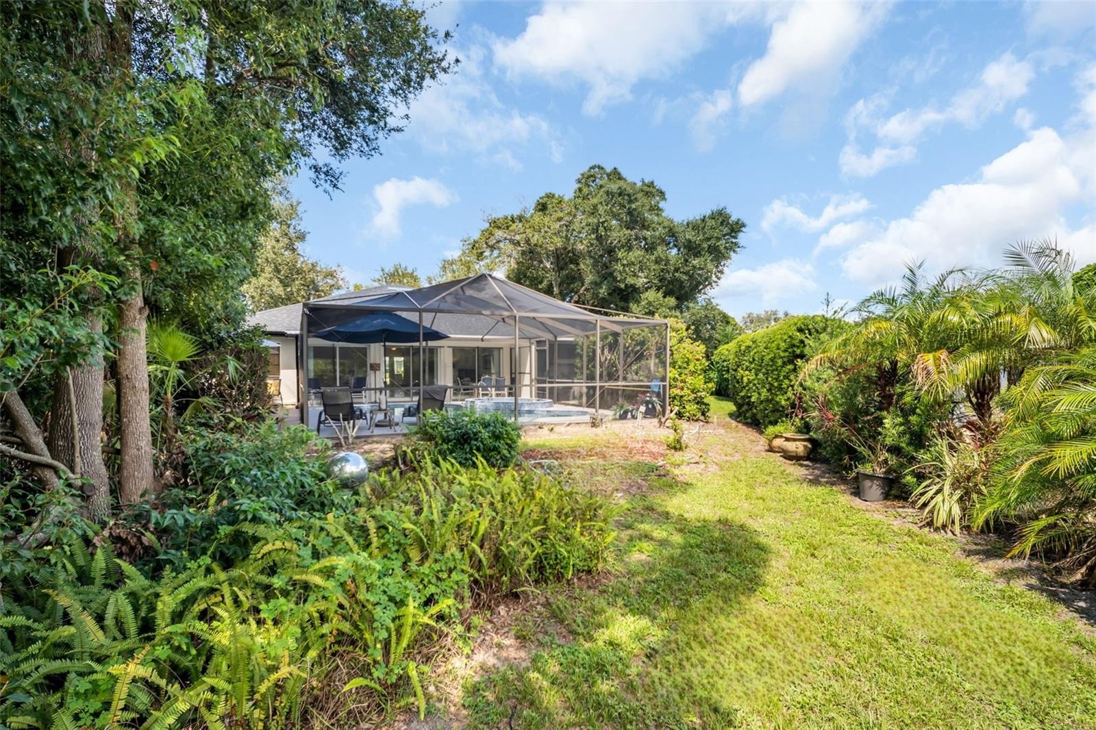 Beautifully landscaped and over a 1/4 of an acre lot~