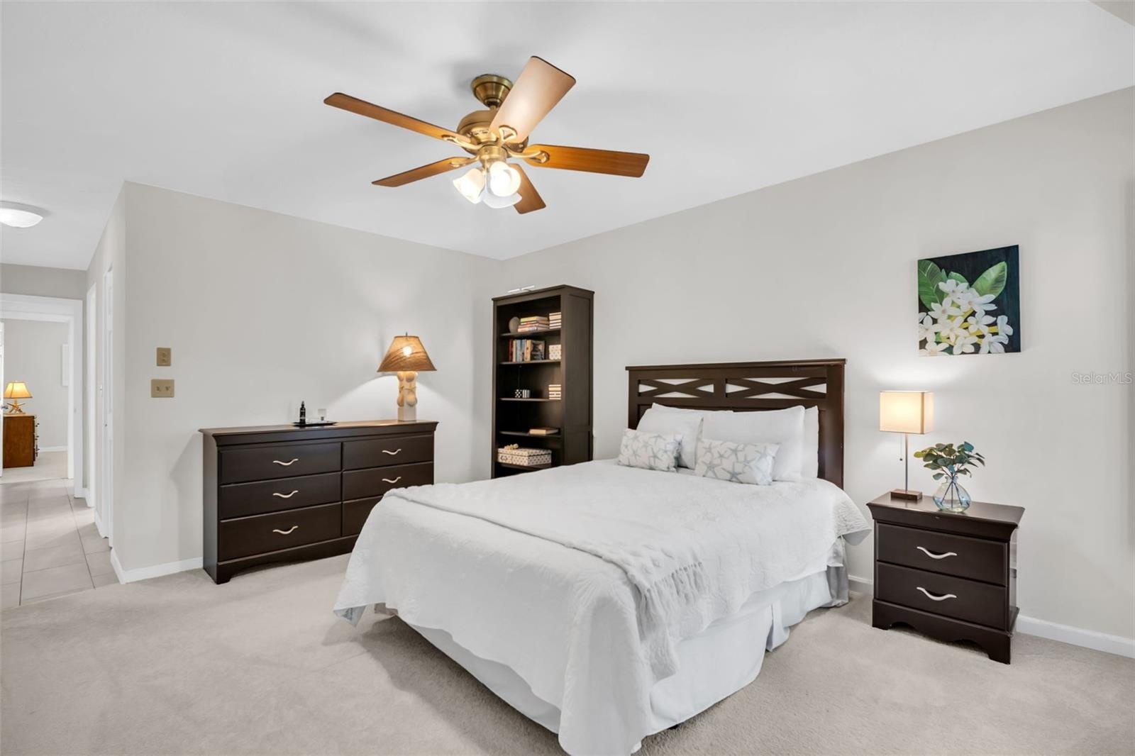 Primary offers a large walk-in closet and beautifully renovated en-suite bath~