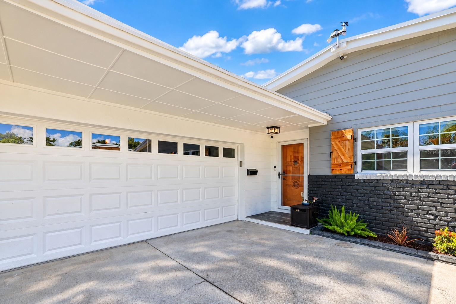 large garage with hoist trolley  for lifting heavy objects to store