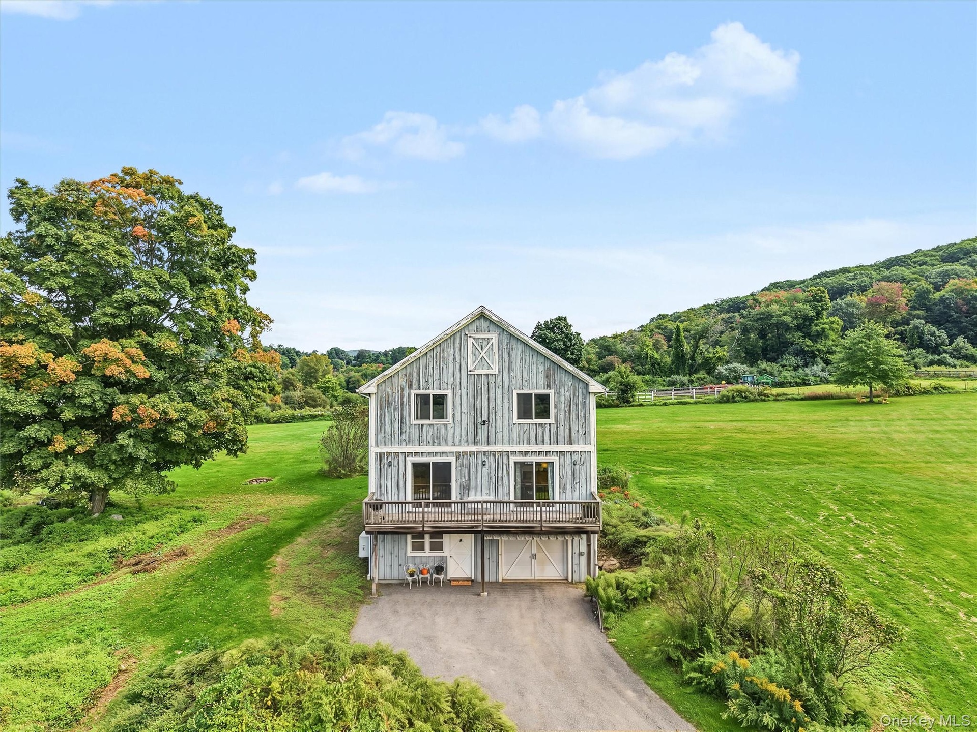 Custom-built in 2002. Barn-inspired architecture.