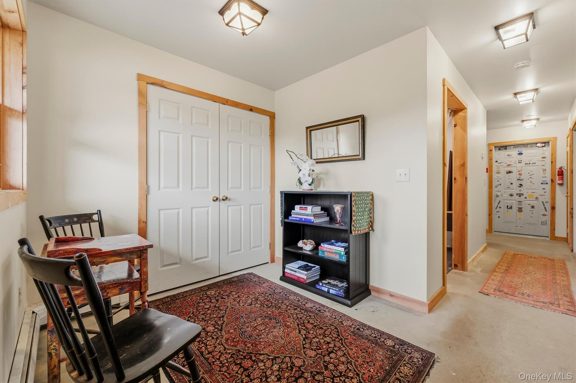 Entryway w/large closet & access to one-car garage and large mechanical room w/good storage.