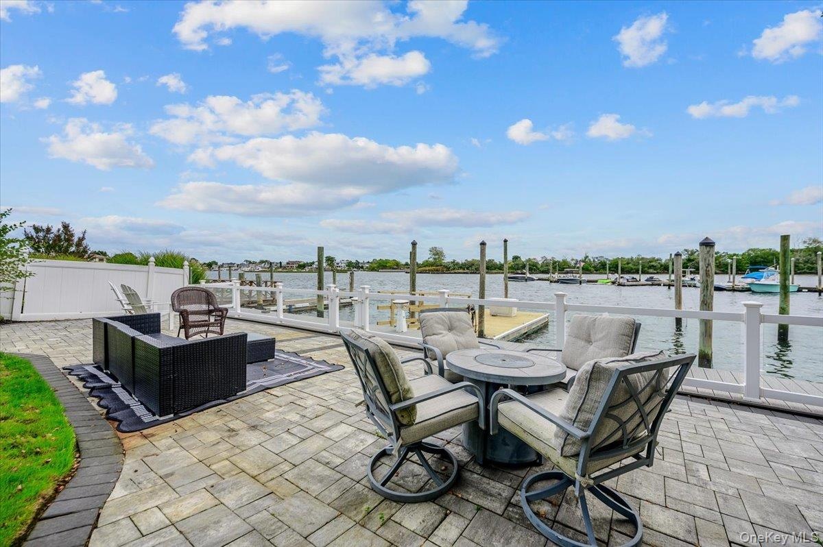 2nd Patio at rear of property by water