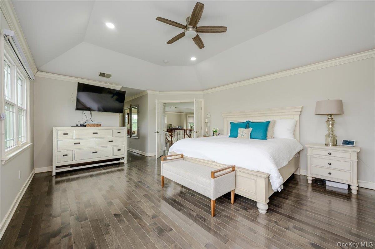 Primary BR En-Suite w/ Full Bath and 2 Closets. Crown molding.