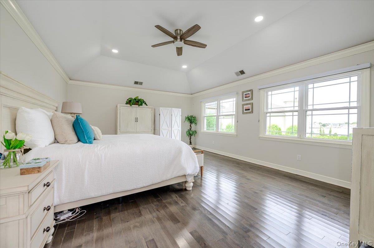 Primary BR En-Suite w/ Full Bath and 2 Closets. Crown Molding.
