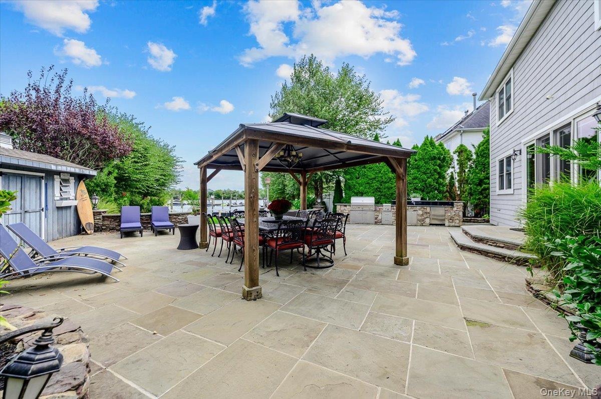 Rear Large Patio w/ Outdoor Kitchen & Pavilion
