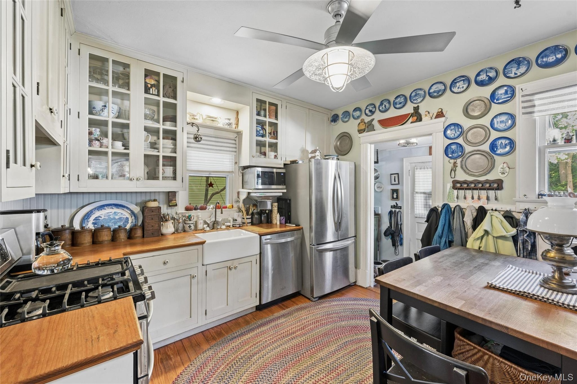Eat-In Kitchen with Farmhouse Sink & Glass-Front Cabinets