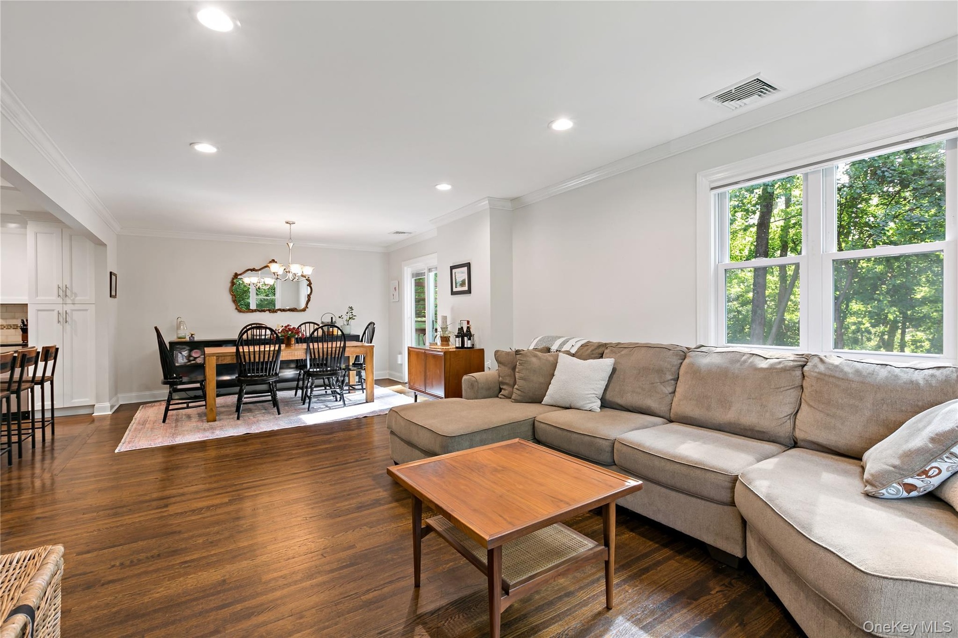 Open and airy floorplan of Living Room and Dining Room