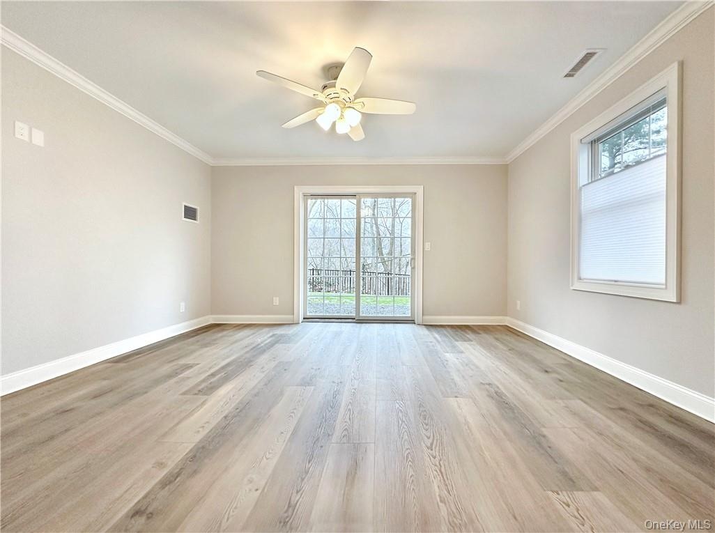 Entry level family room with sliders to patio.