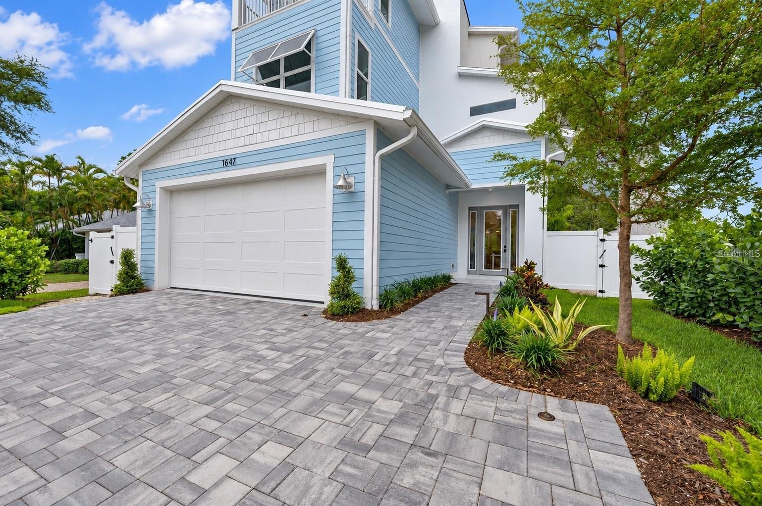 A gate enclosure has since been added for the front door pathway, to create more privacy